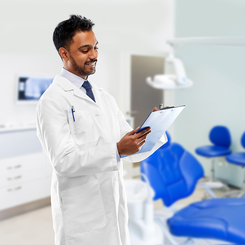 Dentist reassuring a patient at Sri Laasya Dental in Visakhapatnam