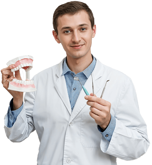 Sri Laasya Dental doctor holding a dental model and instruments